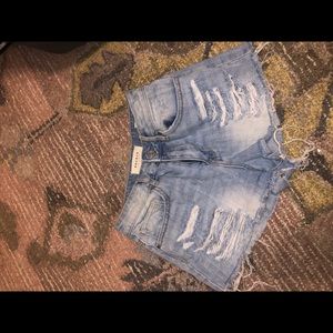 Light wash distressed denim shorts